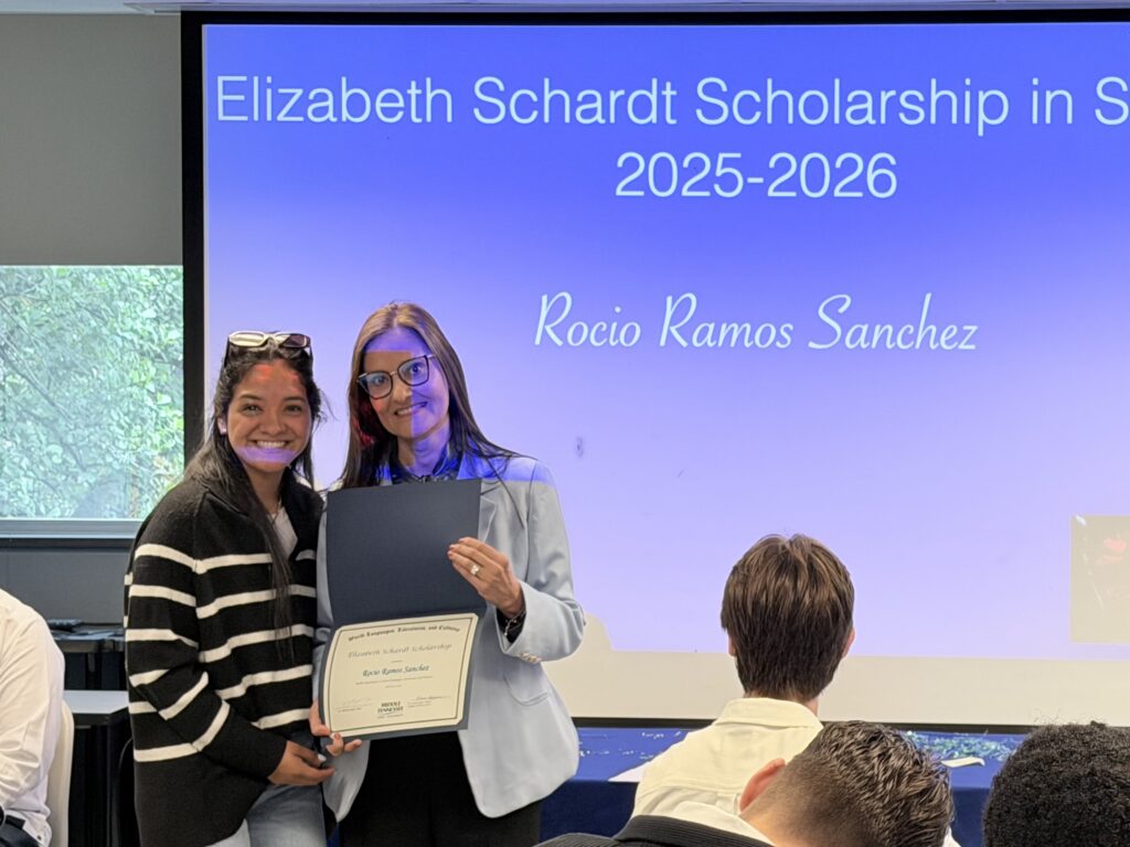 Student recipient of the Elizabeth Schardt Scholarship in Spanish posing with a faculty member.
